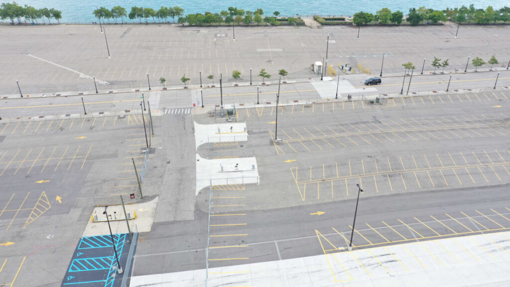 Drone photograph of Detroit Riverfront parking lots near the Renaissance Center.